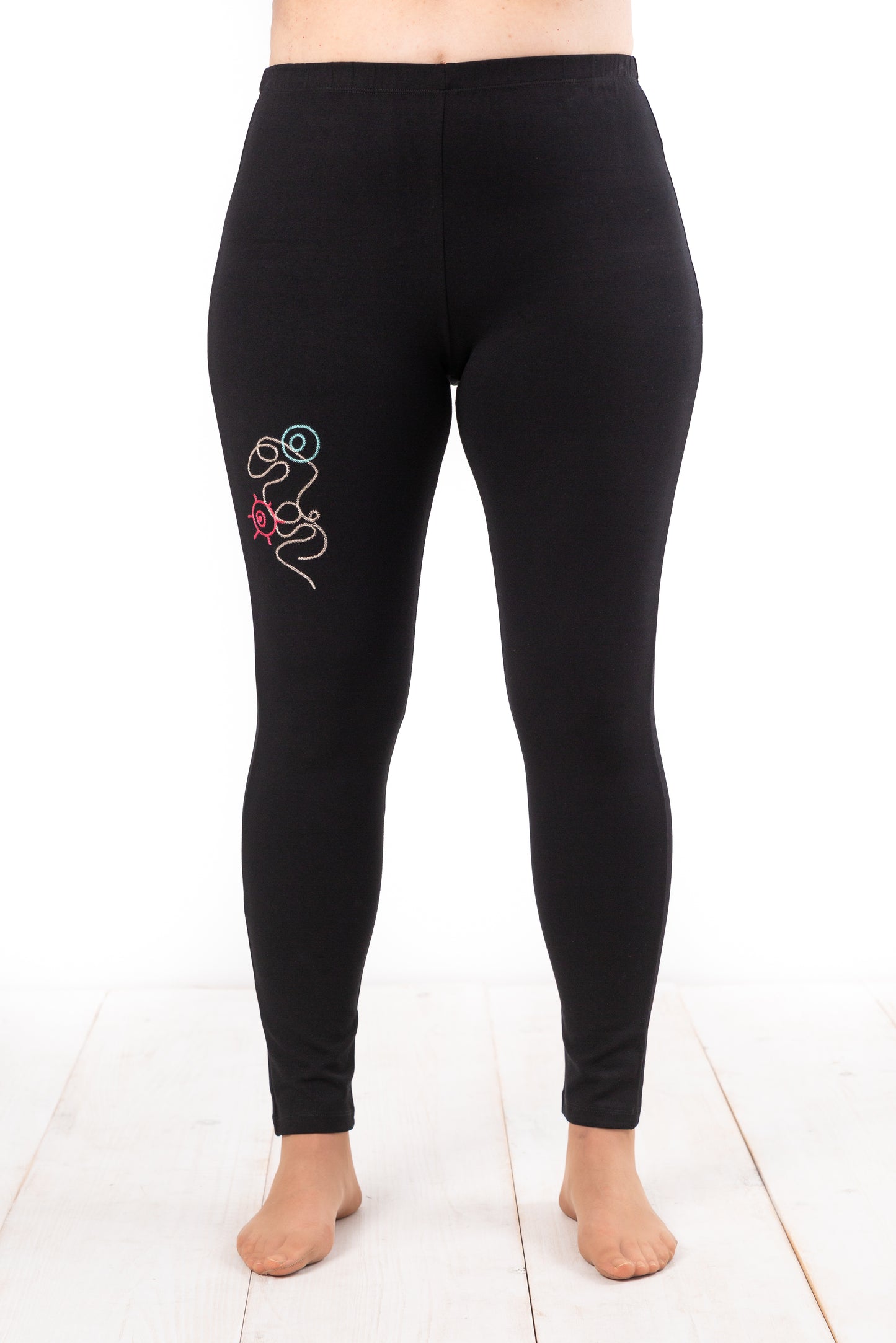 Legging punto roma con bordado